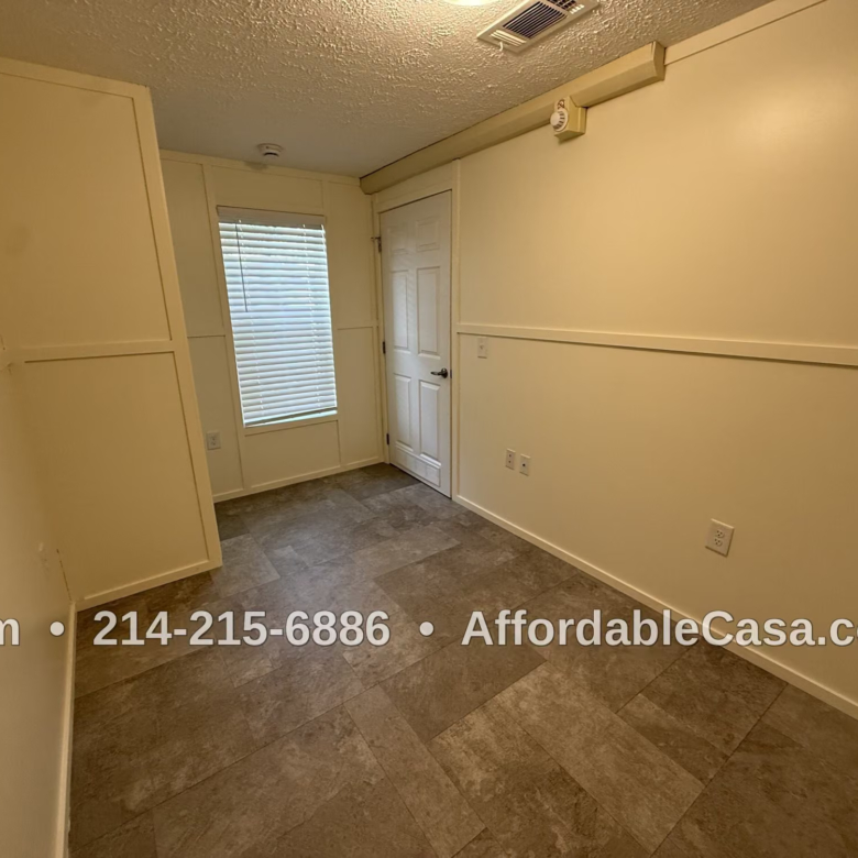 Empty room with a door and interior lighting. Text says "Kim, 214-215-6886, AffordableCasa.com".