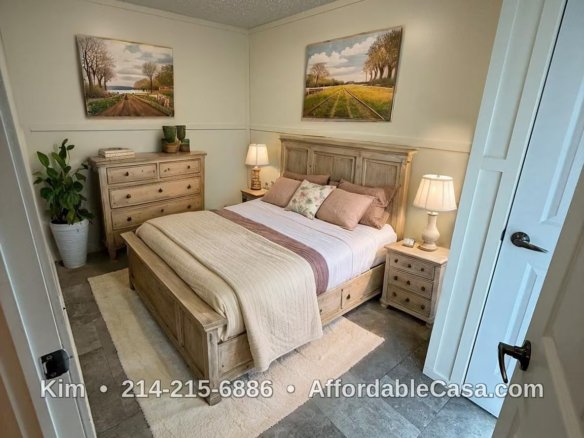 Bedroom with bed, dressers, lamp, and door. Text says "Kim, 214-215-6886, AffordableCasa.com".